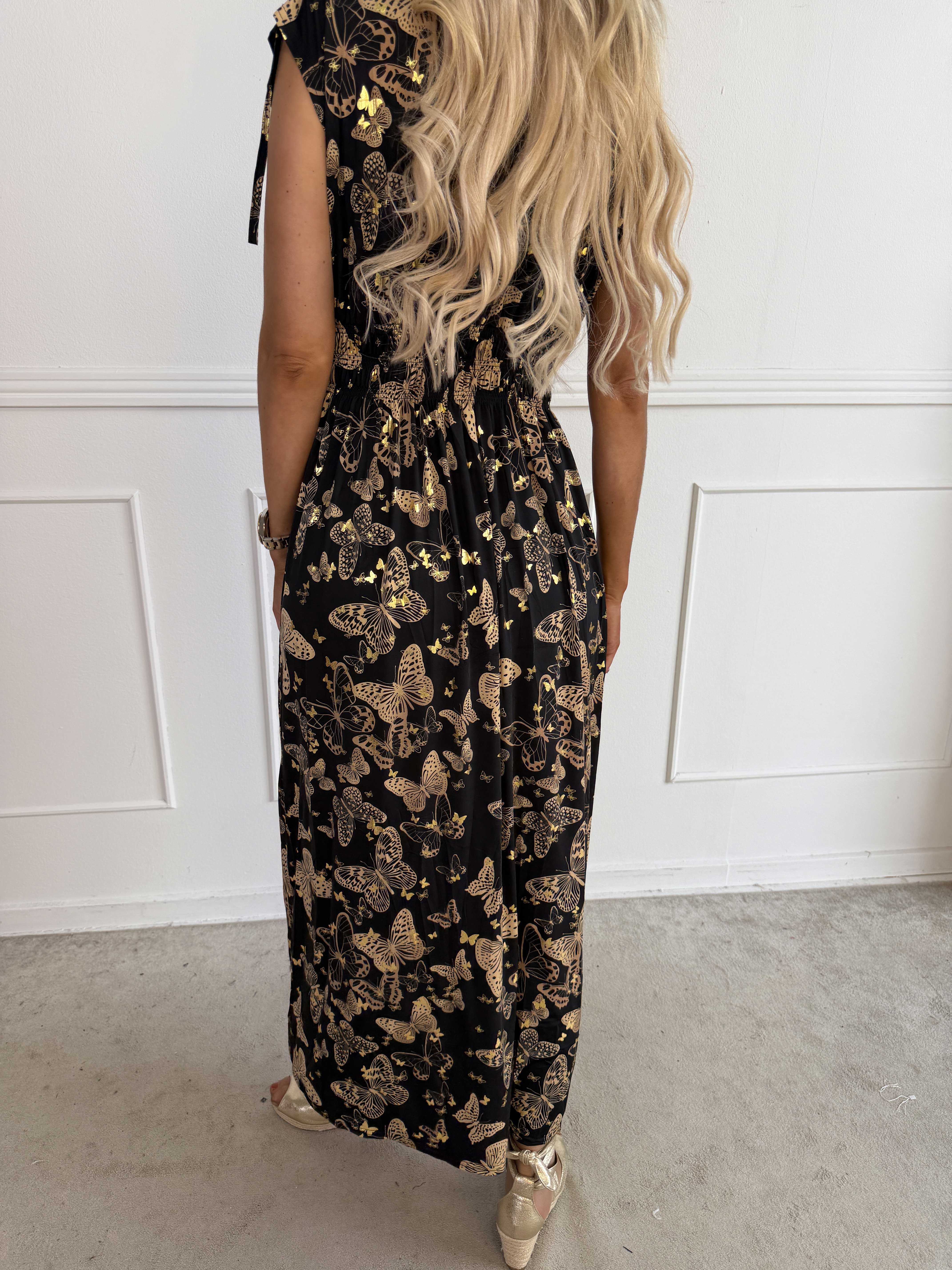Pams Butterfly Sleeveless - A long, stretchy dress with a butterfly print and gold details