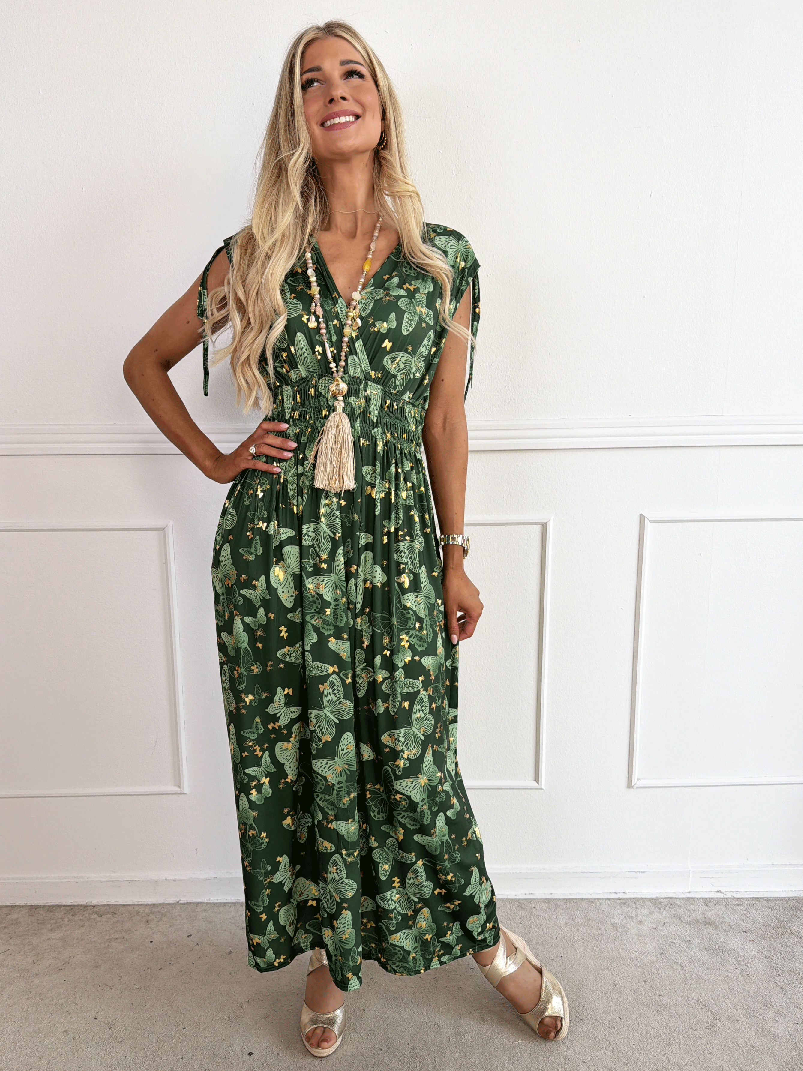 Pams Butterfly Sleeveless - A long, stretchy dress with a butterfly print and gold details