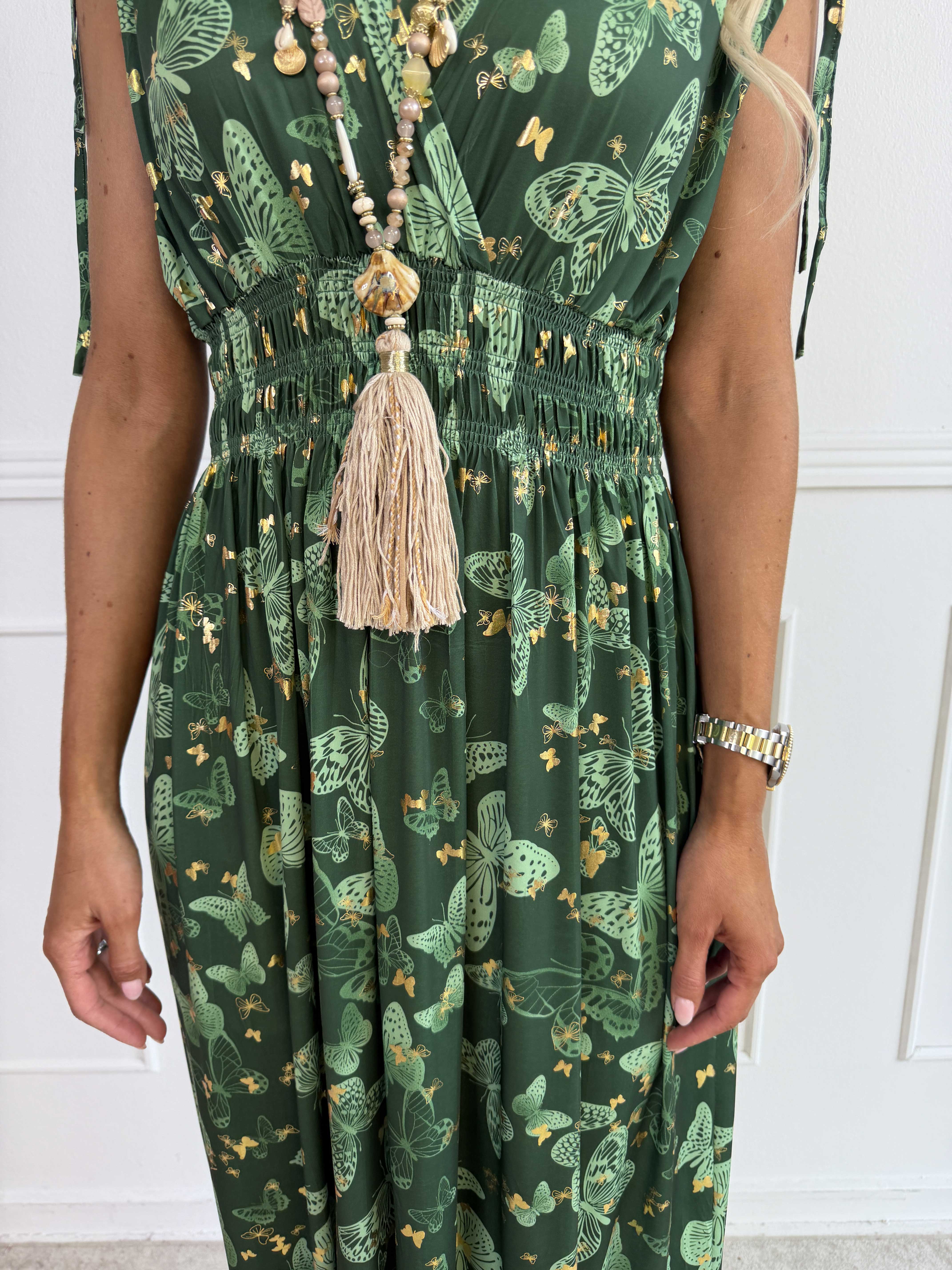 Pams Butterfly Sleeveless - A long, stretchy dress with a butterfly print and gold details