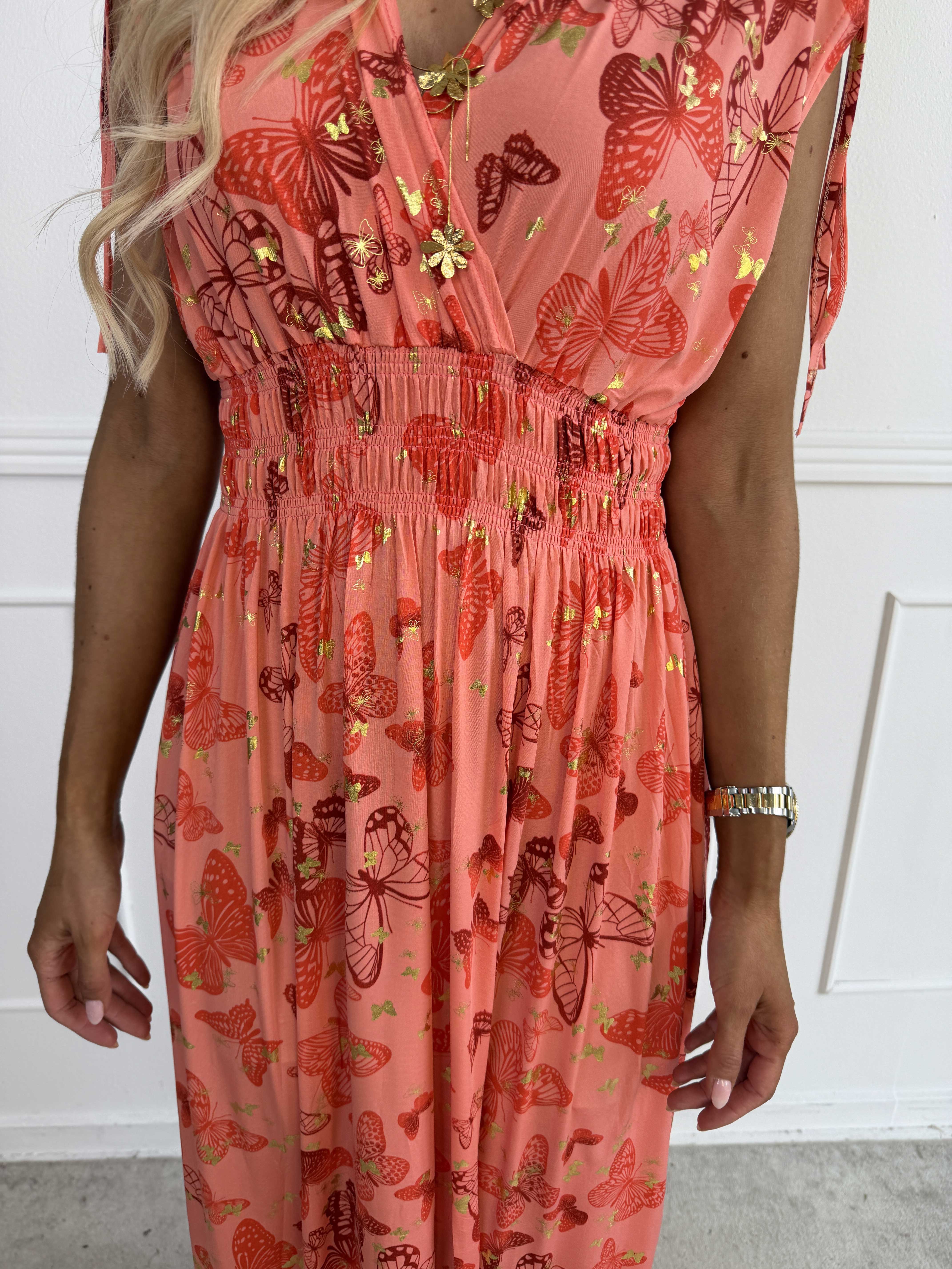 Pams Butterfly Sleeveless - A long, stretchy dress with a butterfly print and gold details