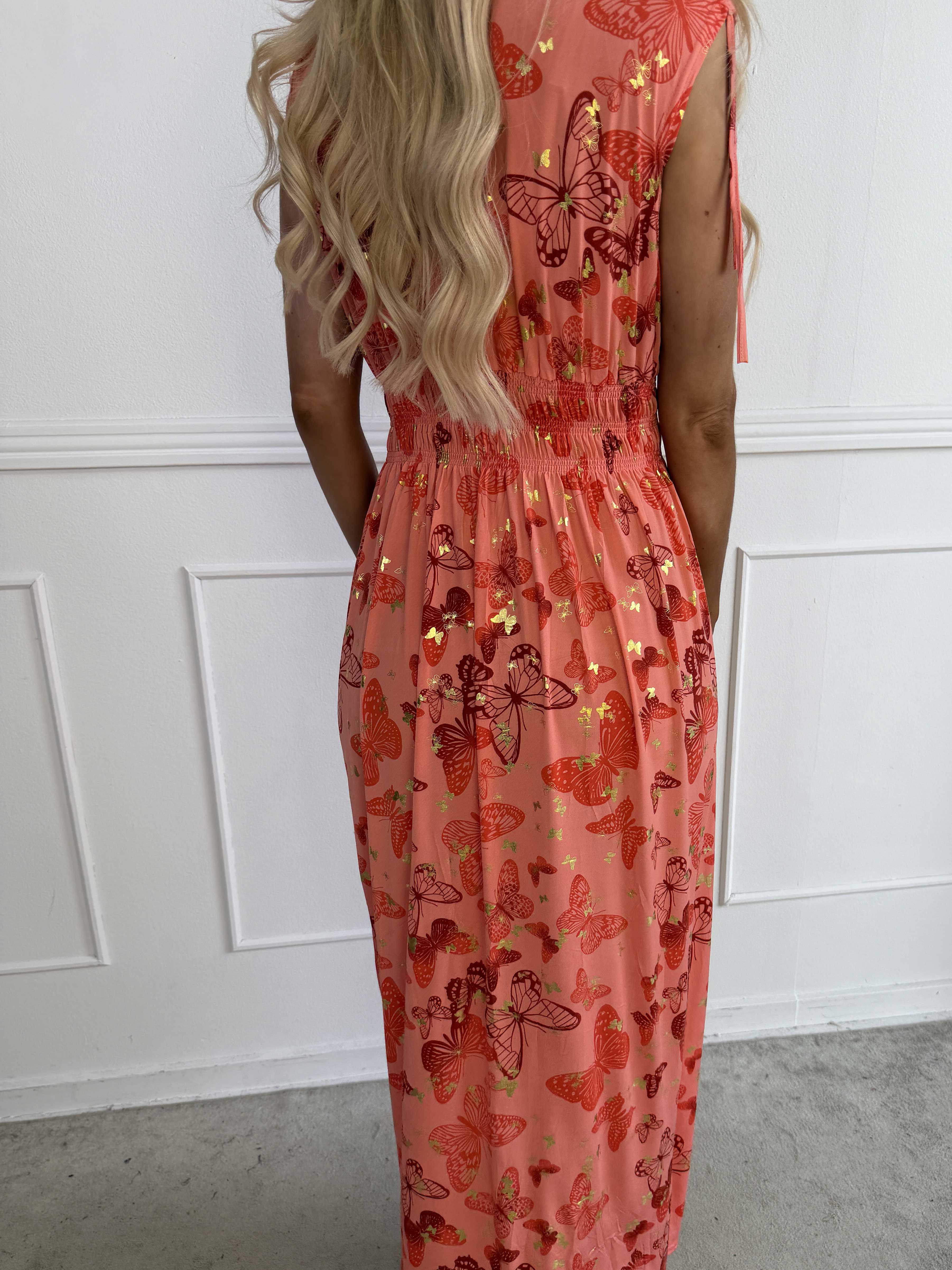 Pams Butterfly Sleeveless - A long, stretchy dress with a butterfly print and gold details