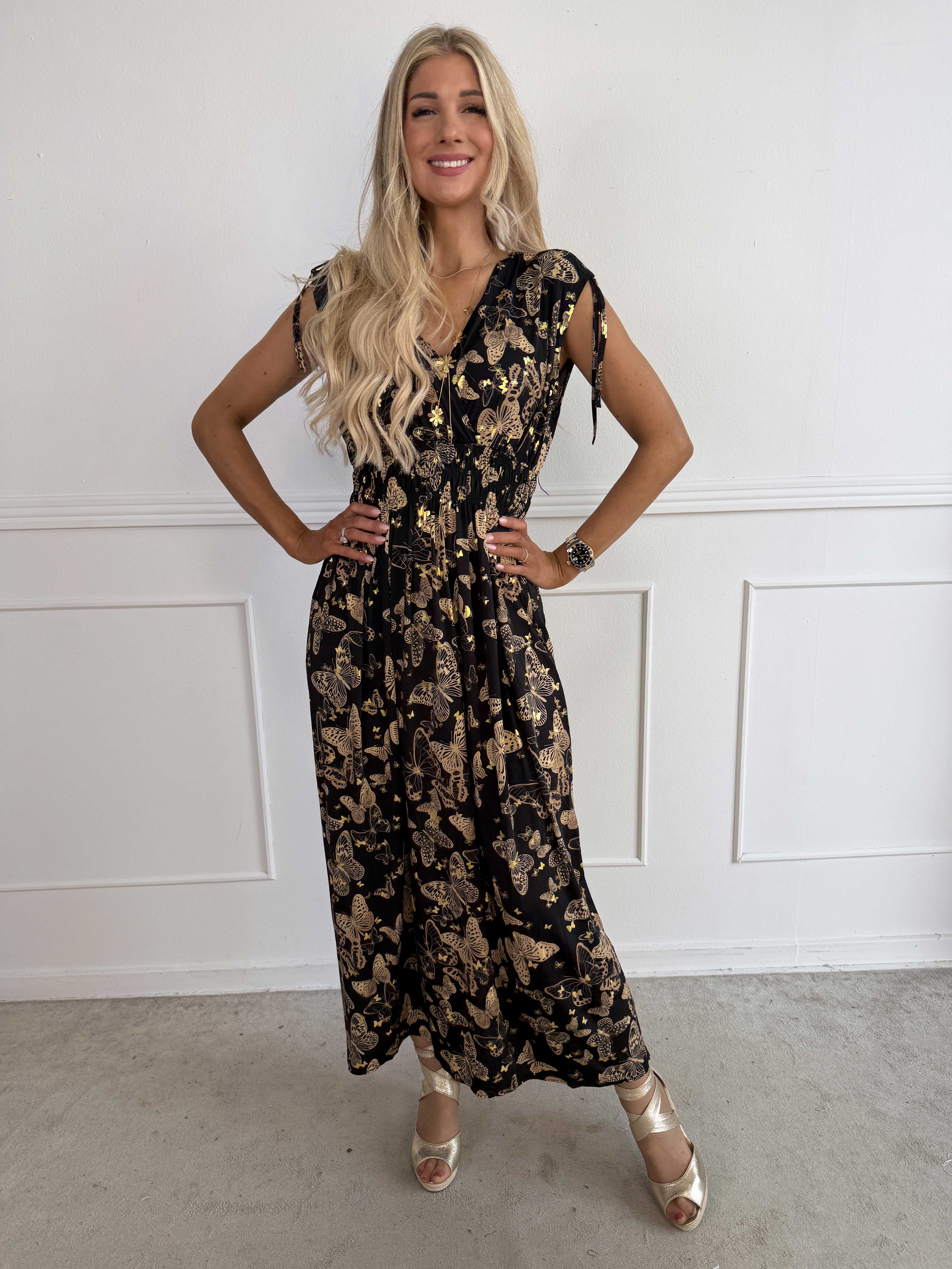 Pams Butterfly Sleeveless - A long, stretchy dress with a butterfly print and gold details