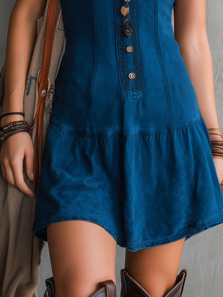 Bohemian indigo mini dress with a V-neck, button closure, and sleeveless design